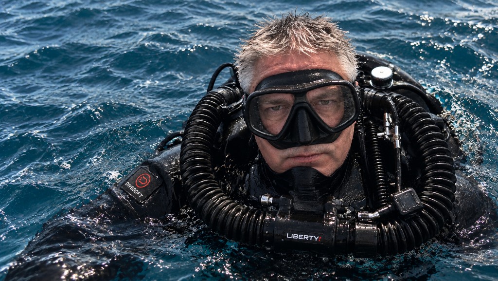 Technical diver with rebreather at the surface